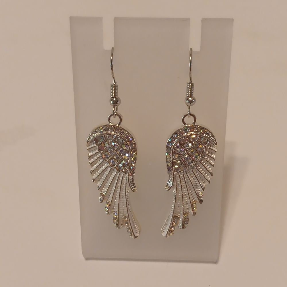 Pair of silver Angel wing earrings New in bag